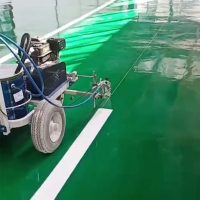 Airless High Pressure Cold paint striper spray lines on epoxy floor